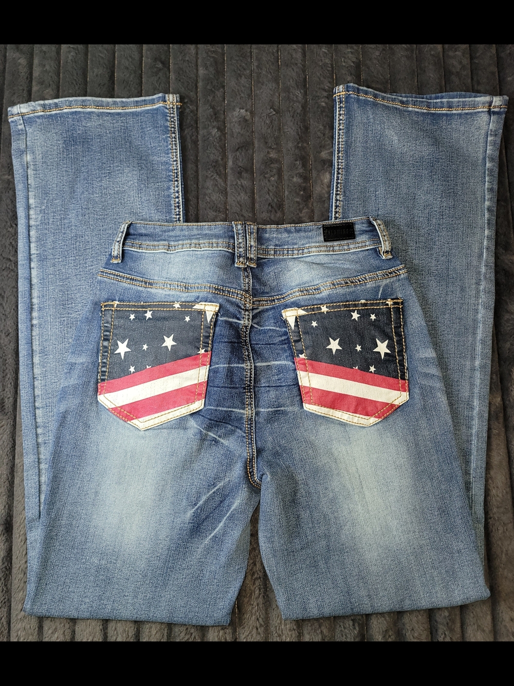 Women’s Light Blue Boot Cut Jeans with Flag Pocket Detail